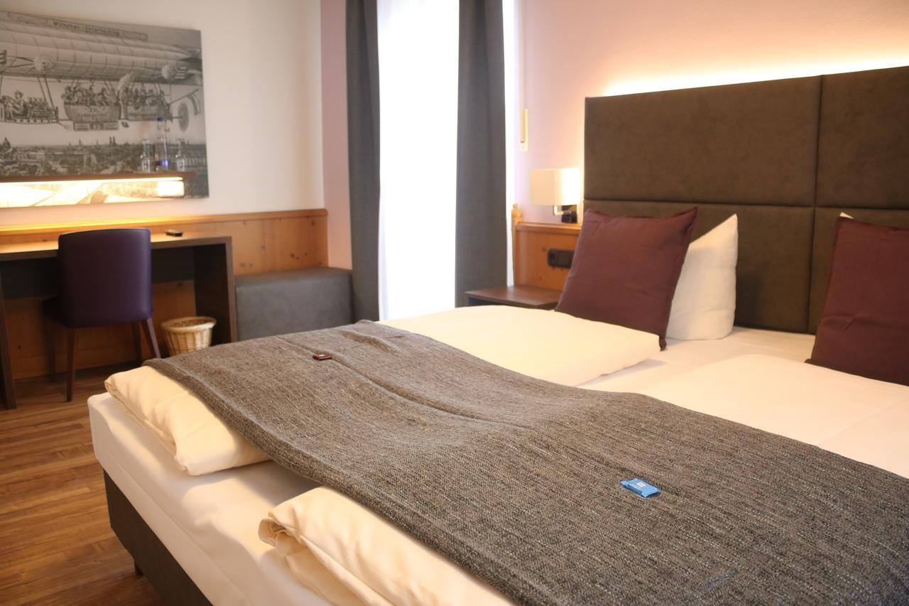 Boutique Hotel Beckenlehner Unterhaching Bagian luar foto